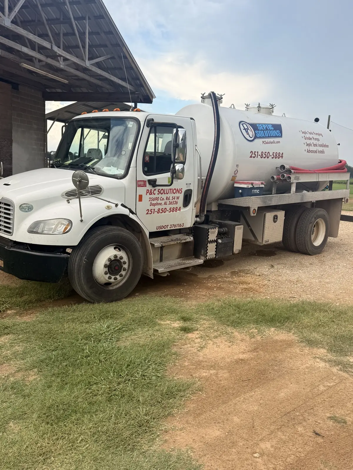 P&C septic pump truck parked at a job site